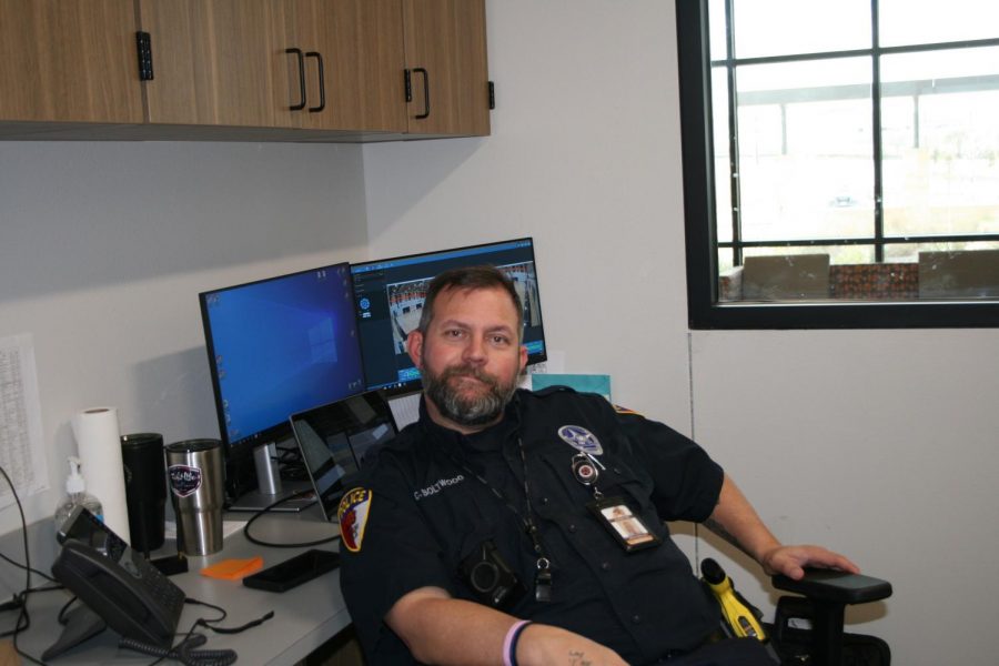 Officer boltwood siting in his chair