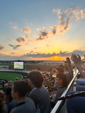 ExtravaBANDza. Band students just finished playing their 3 tunes and started to watch the marching band play "Havanna Nights"  The band students spent about a week practicing their songs for this performance "Stick with it," 8th grader Kip Cotten said "it (band) gets way more fun." 