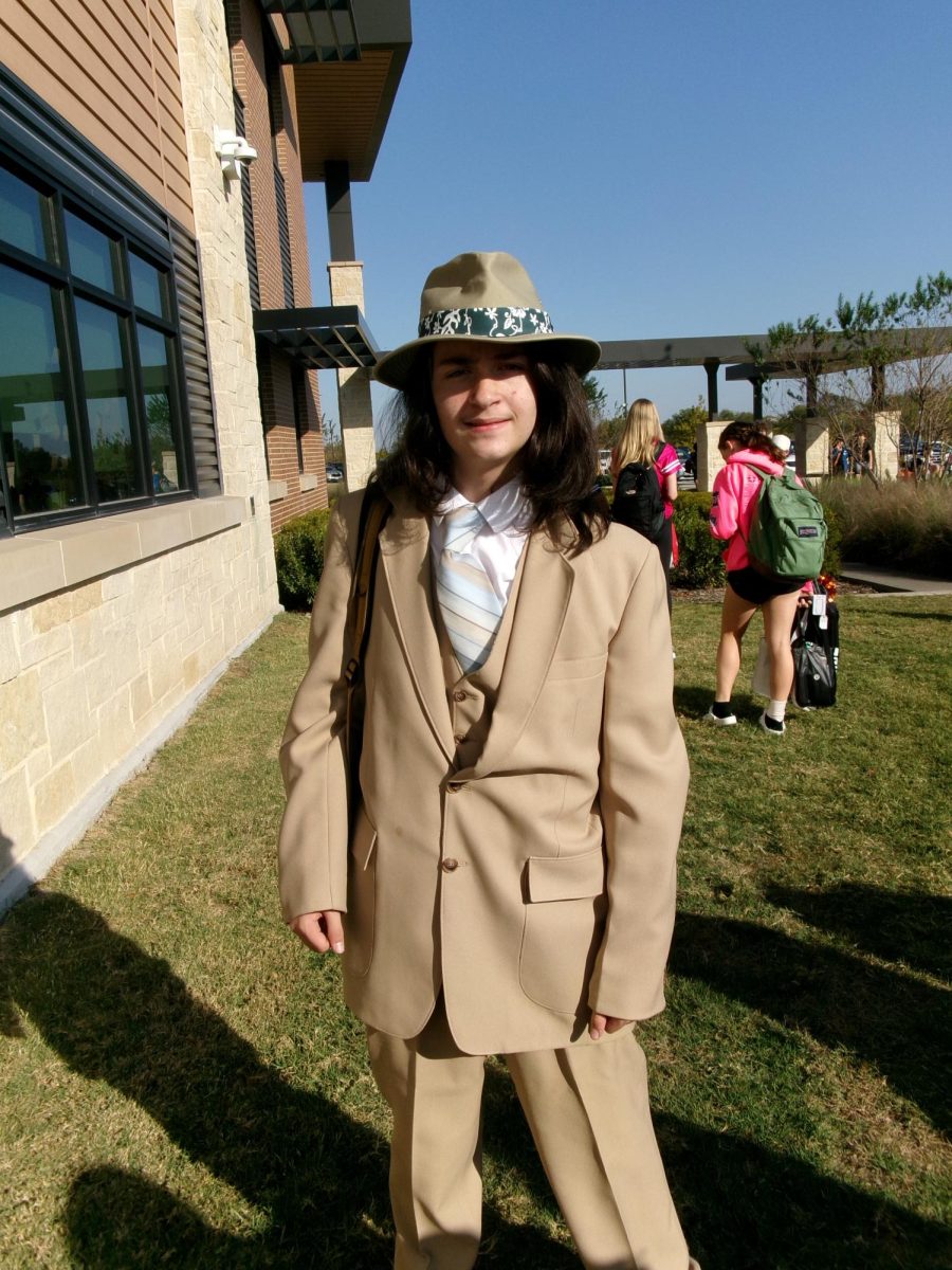 Dress to Impress! Archer Hokit, 8, dresses in his Halloween costume on Oct. 31, in honor of the last day of Red Ribbon Week, and Halloween. Hokit wore the same outfit to go trick-or-treating that night. “I get the chance to dress up so I do it,” Hokit said.